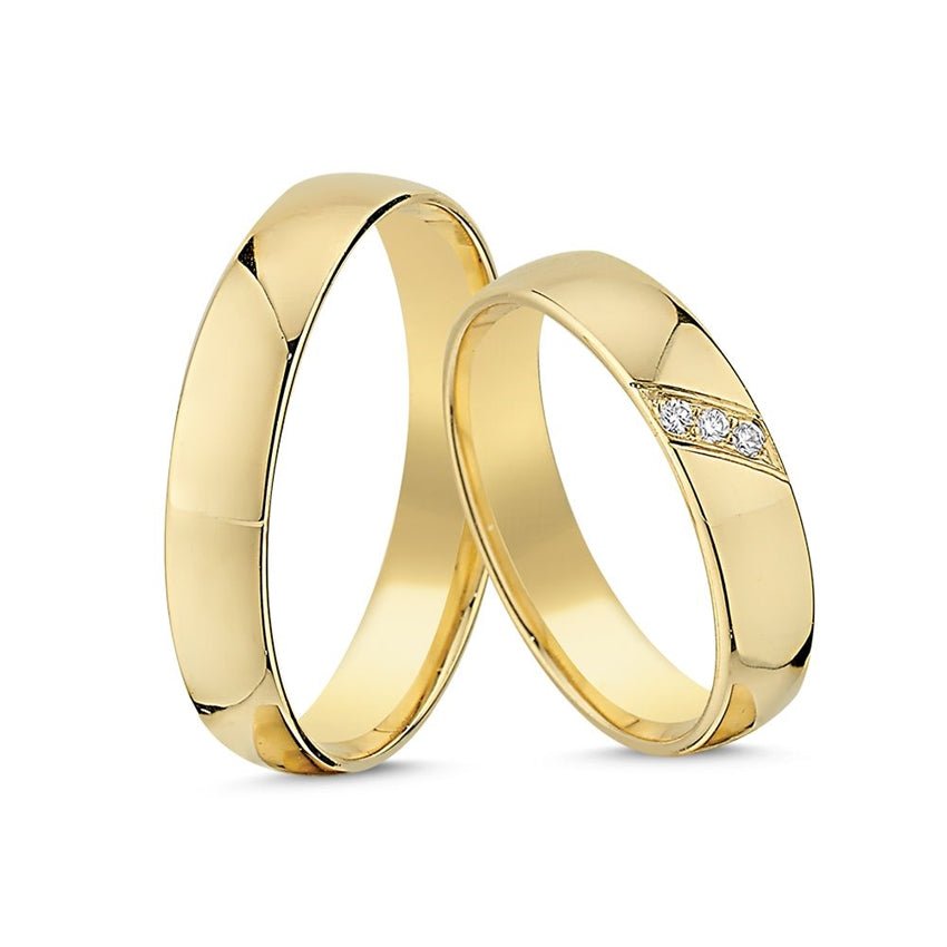 Unikke Nuran vielsesringe i 14 kt guld med 3 diamanter på dameringen og klassisk herrering.